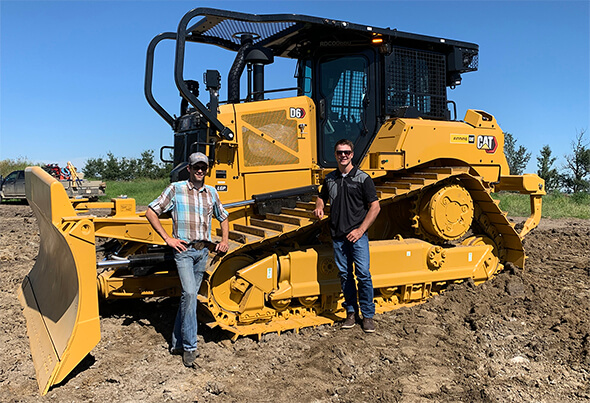Luke Grinde with Finning Sales Rep Riley Wik