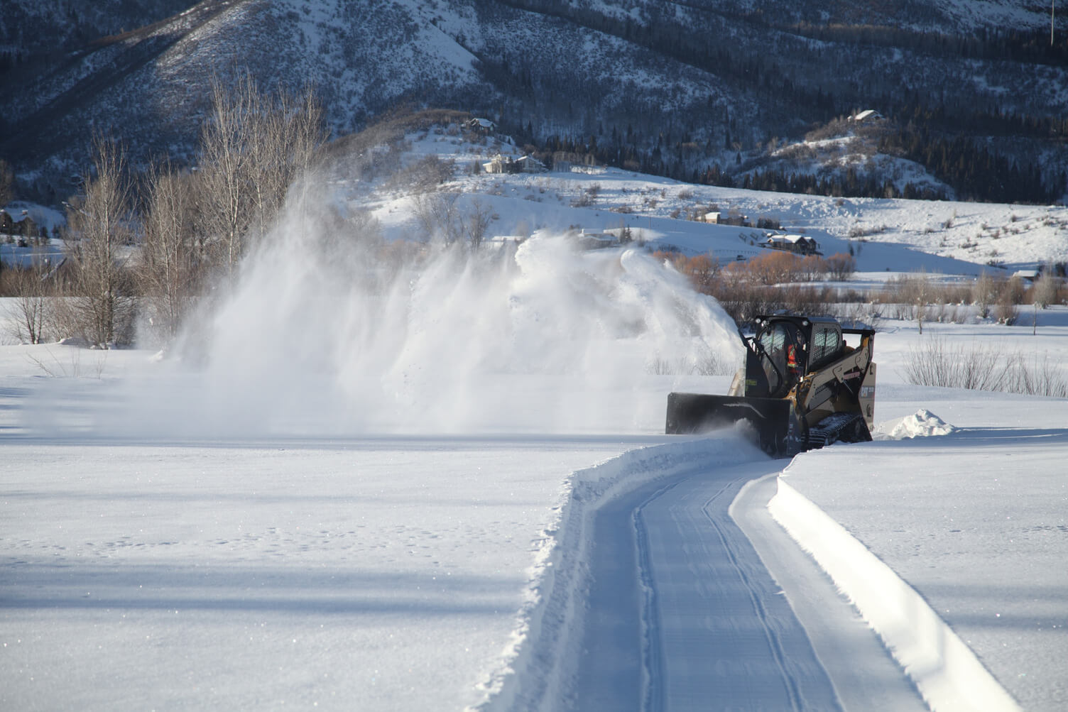 Skid Steer removing snow
