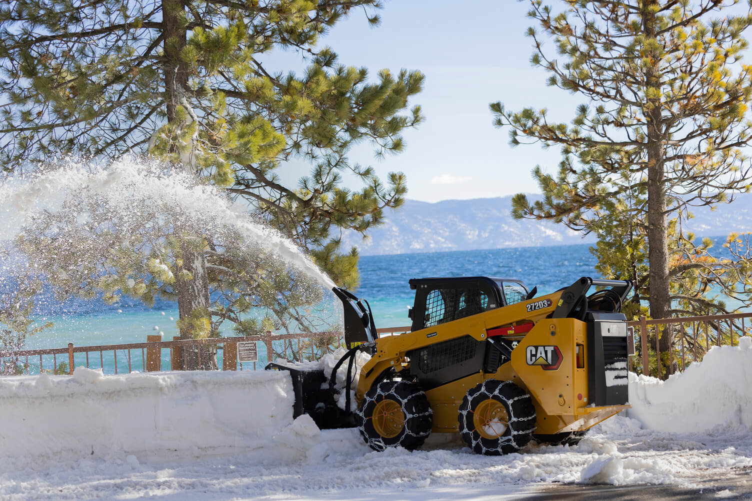 Skid Steer removing snow
